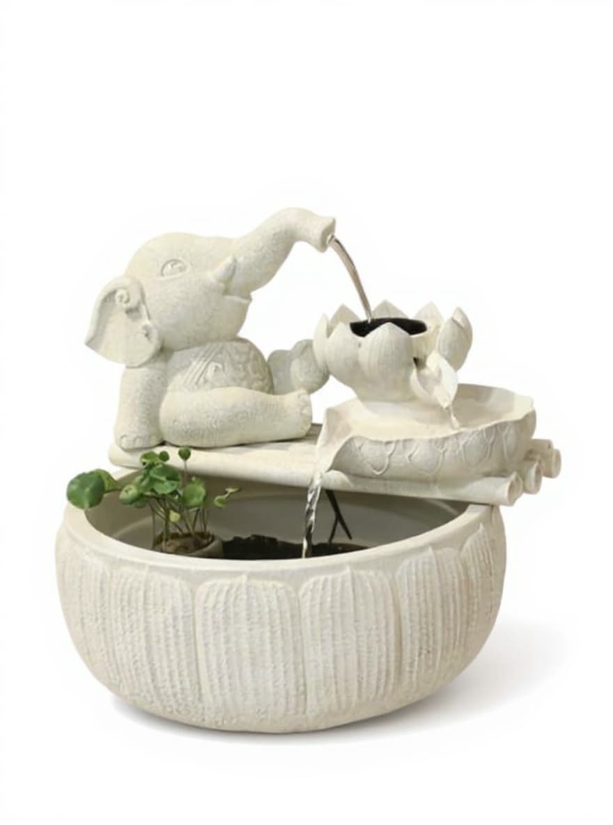 white ceramic fountain