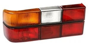 automotive taillight assembly with amber, clear, and red lenses