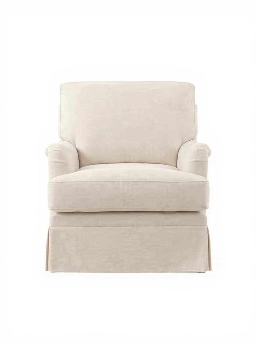 beige upholstered armchair