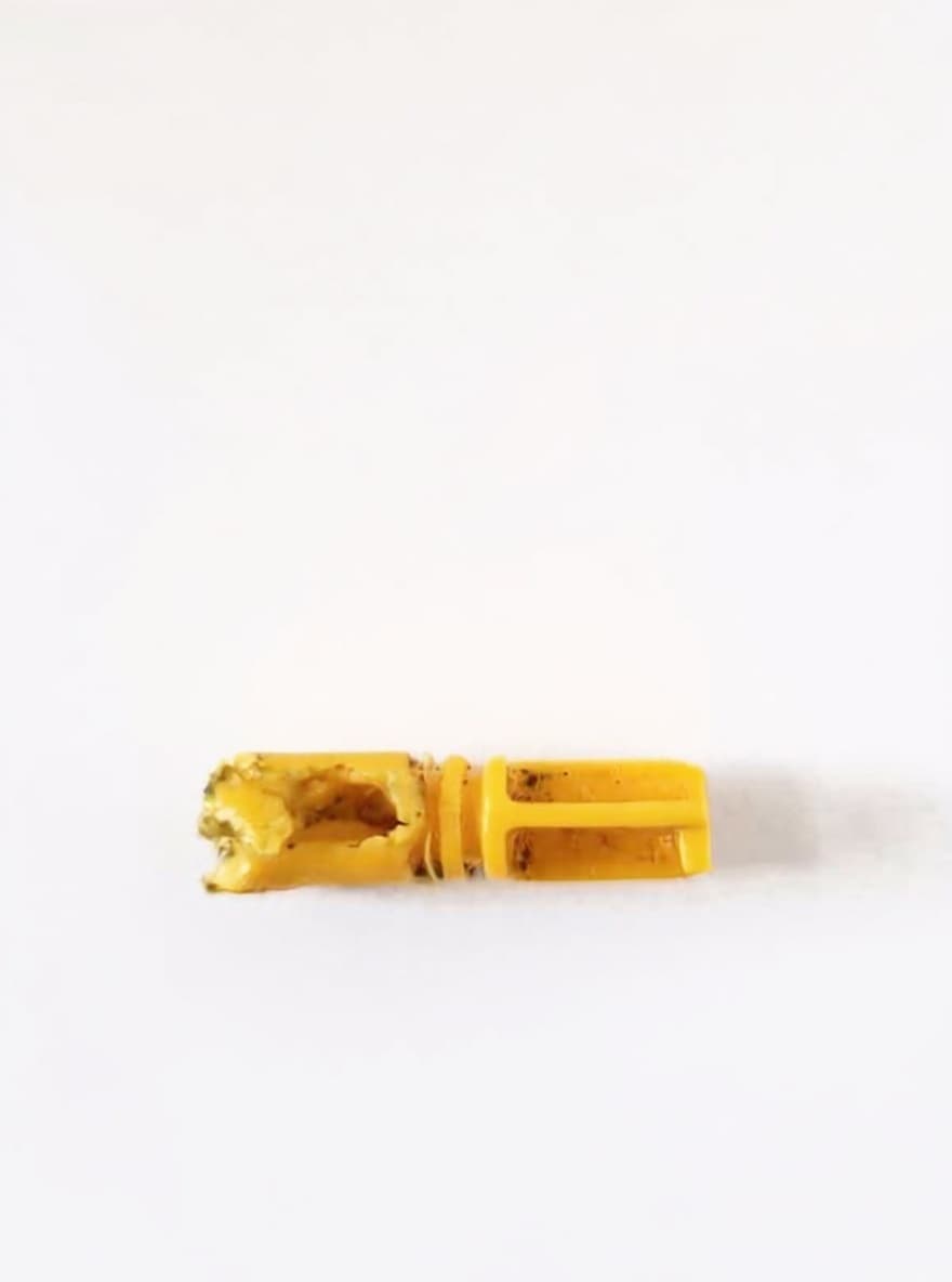 yellow plastic object