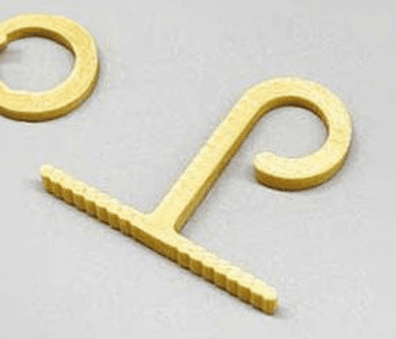 yellow plastic letter