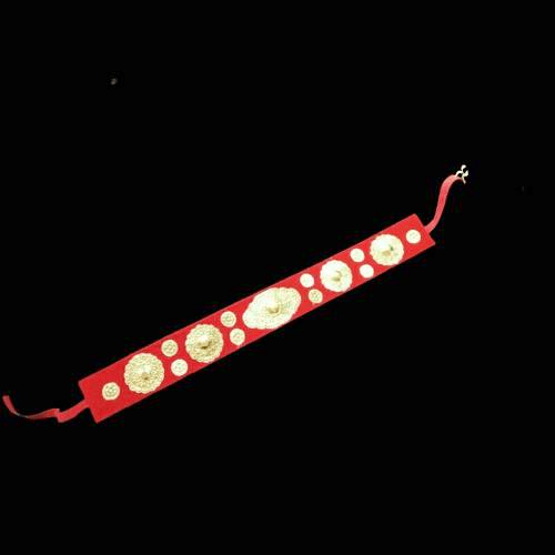 red fabric bracelet