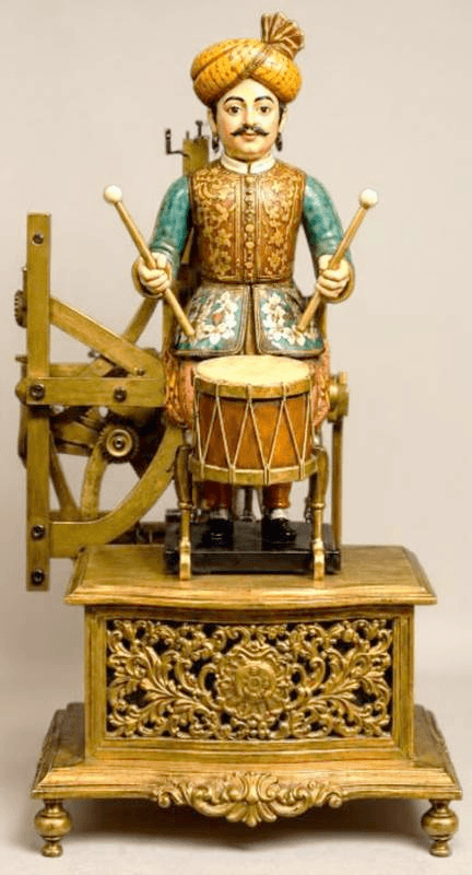 ornate wooden drummer
