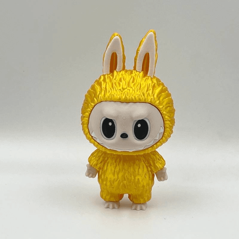 yellow rabbit figurine