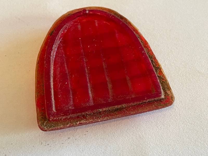 reddish-brown plastic object