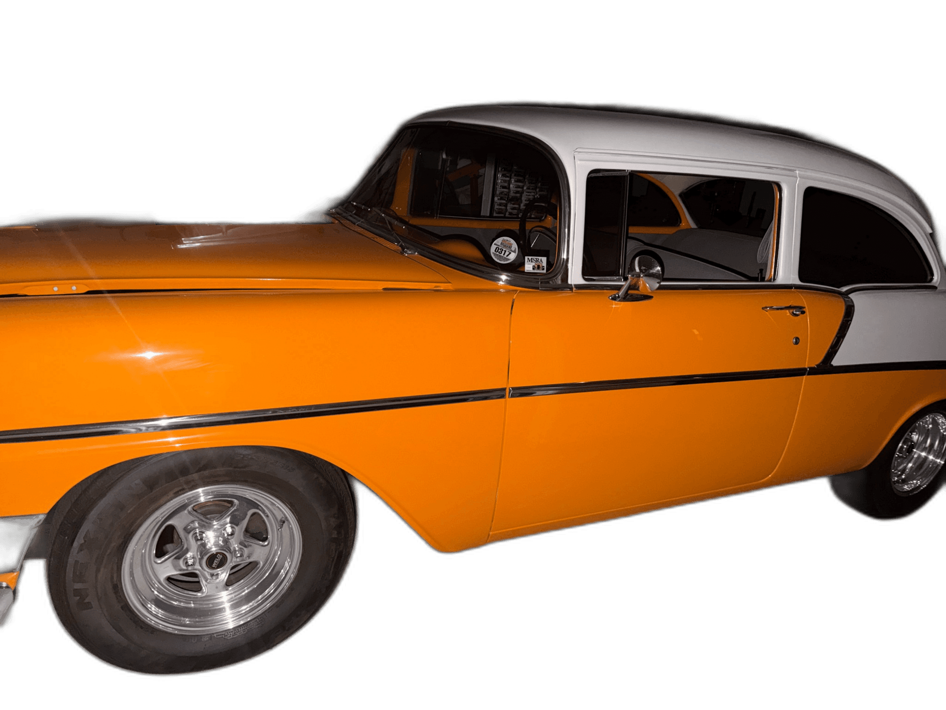 orange and white classic Chevrolet car