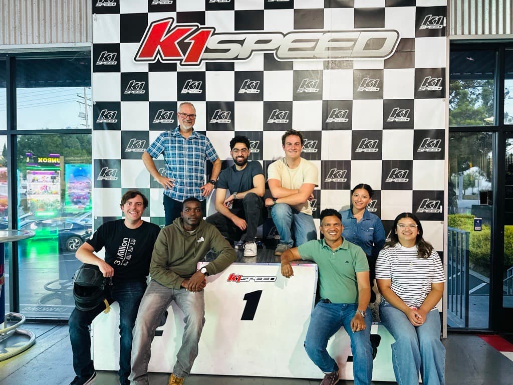 K1 Speed checkered flag backdrop with podium