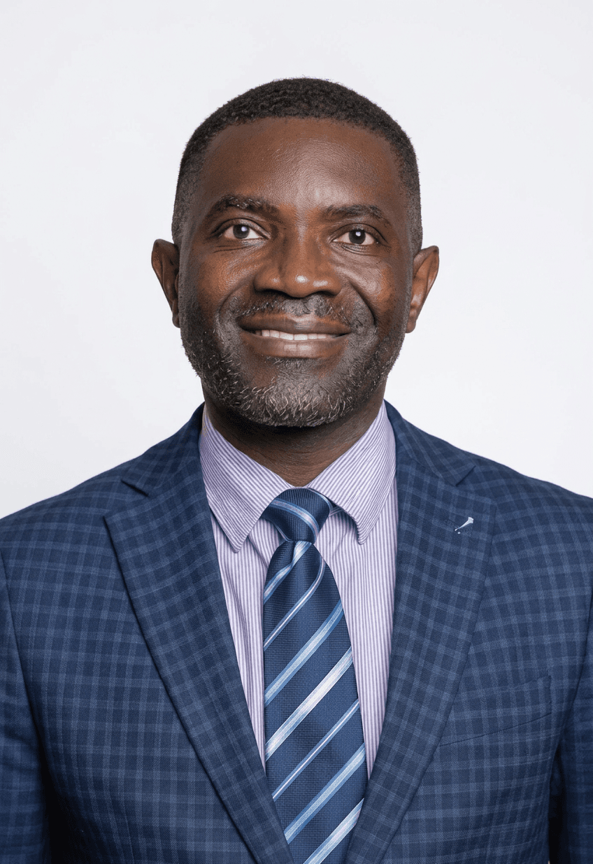 smiling man in blue plaid suit and striped tie
