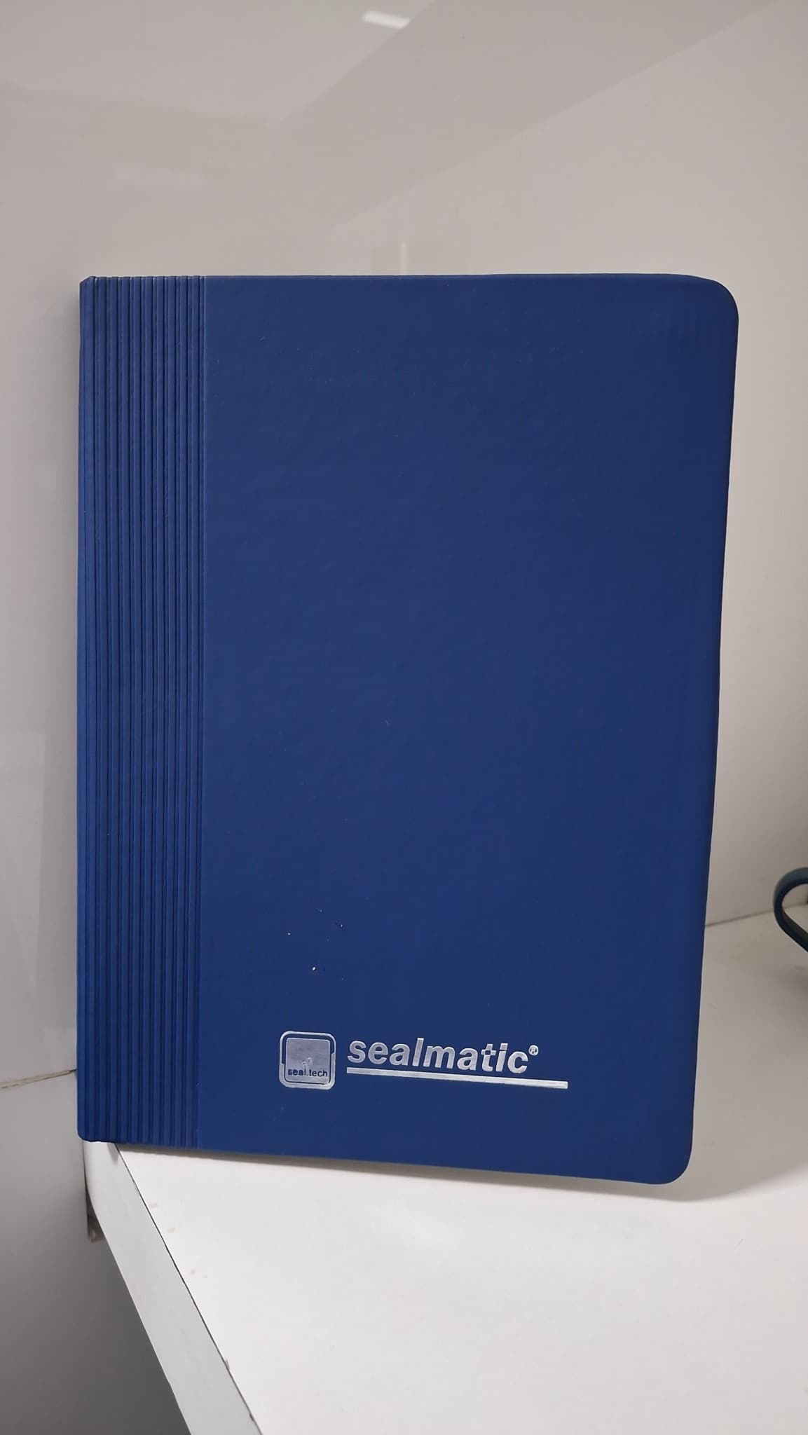 blue Sealmatic 'seal tech' binder